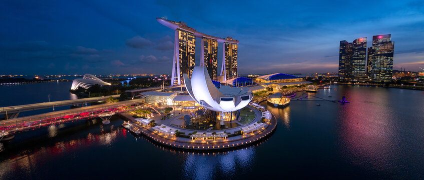 Singapore - Mar 17, 2025: Singapore Marina Bay Waterfront at Night &ndash; Aerial Cityscape