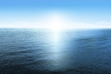 Fototapeta premium sea and sky/Ocean water in blue tones with horizon, sunlight reflection, and natural seascape surface.