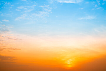 Beautiful , luxury soft gradient orange gold clouds and sunlight on the blue sky perfect for the background, take in evening,Twilight, Large size, high definition landscape photo