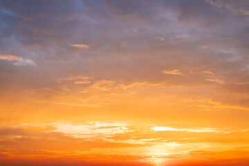 Beautiful , luxury soft gradient orange gold clouds and sunlight on the blue sky perfect for the background, take in evening,Twilight, Large size, high definition landscape photo
