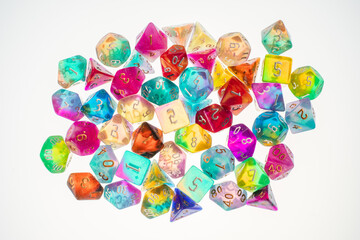 different colours dices for fantasy dnd and rpg tabletop games. Board game polyhedral dices with different sides isolated on white background