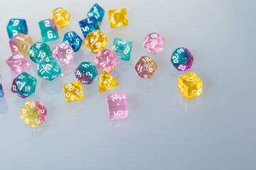 different colours dices for fantasy dnd and rpg tabletop games. Board game polyhedral dices with different sides isolated on white background