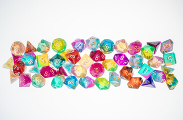 different colours dices for fantasy dnd and rpg tabletop games. Board game polyhedral dices with different sides isolated on white background