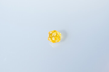 yellow dices for fantasy dnd and rpg tabletop games. Board game polyhedral dices with different sides isolated on white background