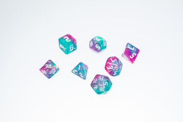 different colours dices for fantasy dnd and rpg tabletop games. Board game polyhedral dices with different sides isolated on white background