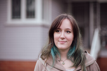Student with Dyed Hair in Front of home