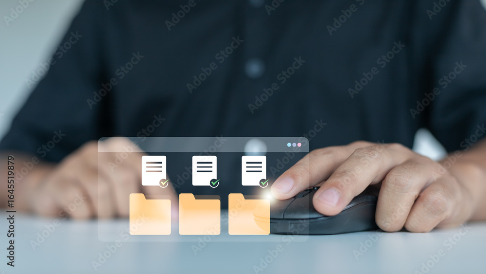 Poster person using a computer mouse to manage digital folders and verified documents with virtual icons, c