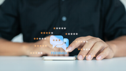 Person using smartphone to give customer feedback and online ratings with chat and review icons,...