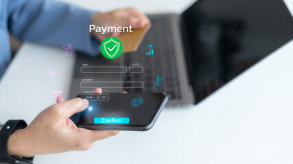 Person holding smartphone and credit card with secure online payment confirmation form on virtual screen, concept of e-commerce and digital financial transaction