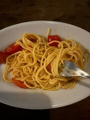 Classic spaghetti coated in rich tomato sauce, offering a simple yet delicious combination of...