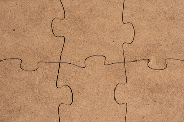 Jigsaw puzzle background, closeup of a piece of jigsaw puzzle.