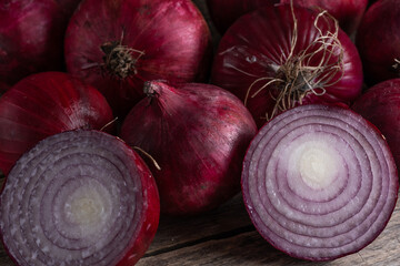 Closeup of fresh red onion bulbs. Healthy food vegetables.