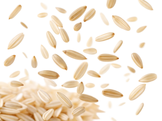 Close up view of scattered grains of rice against a black background creating a dynamic composition
