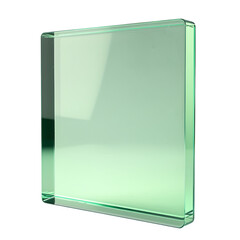 A close up view of a transparent green glass block against a black background in studio lighting