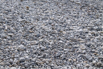 The Stones and Pebbles on a Coastal Seaside Beach.