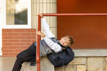 Cute first grade school child,  going to school. First day at school for a firstgrader, child...