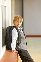 Cute first grade school child,  going to school. First day at school for a firstgrader, child...