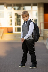 Cute first grade school child,  going to school. First day at school for a firstgrader, child...