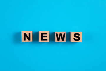news word with wooden cubes