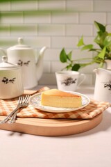 Cheesecake in ceramic plate on white background