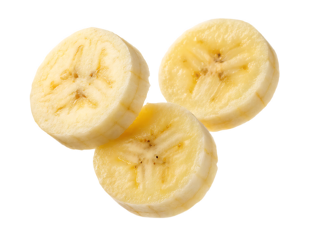 Three banana slices arranged in a triangular formation against a black background close up shot