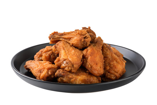 Crispy Fried Chicken Wings Served on a Black Plate Isolated on White Background Culinary Delights