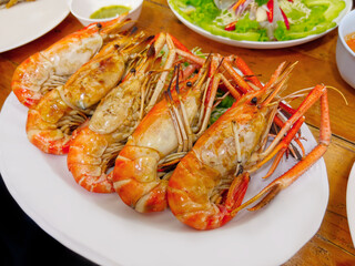 Popular Thai Grilled Prawns on White Plate with Spicy Sauce
