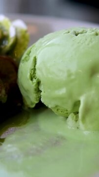 ice cream matcho green waffles cream Eating a slice dessert with a fork. High quality 4k footage