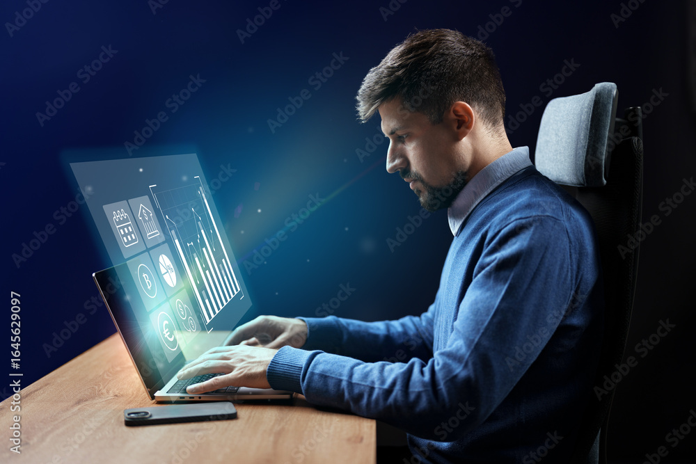 Poster professional man works on computer displaying financial data and graphs in a modern office setting d