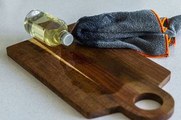 Oiling a Wooden Cutting Board with Mineral Oil and Microfiber Cloth