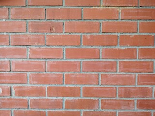 Brick wall with red brown brick texture consist of brick in horizontal for background about industry, architecture, construction. Abstract horizontal line or texture. 3D render.