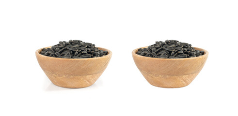 Sunflower seeds pile isolated, black oil sun flower grains group with shell, fresh edible oil seeds heap