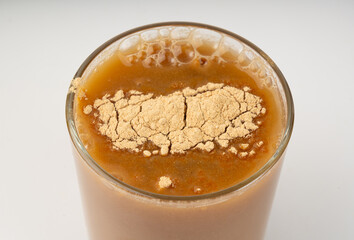 Maca powder drink isolated, dry Peruvian ginseng beverage, powder in water, ground ayak willku tea