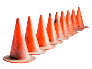 A row of bright orange traffic cones arranged diagonally on a dark surface isolated on transparent background