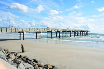 Fishing pier at ocean beach