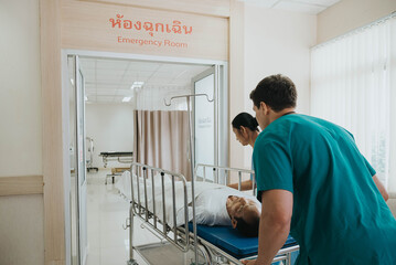 Emergency medical team pushing patient in hospital. Doctors and nurses health care with patient in...