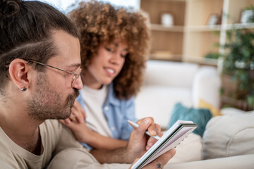 Couple planning finances and budget at home