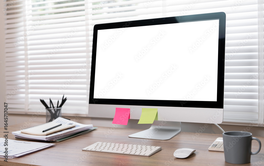 Poster a modern and minimalist office desk with a computer that has a blank white screen, conveying a sense