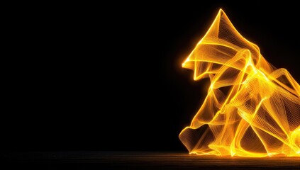 Abstract gold light trails forming a figure on black