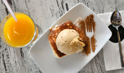 ice cream dessert with orange juice
