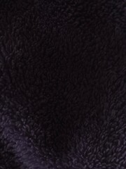 Fototapeta premium Dark purple fleece texture macro