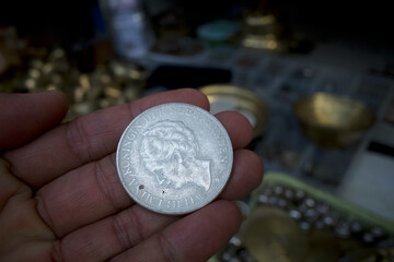 A 1943 Netherland 2 1/2 Gulden coin, the Netherlands Indies currency