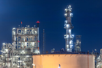 Oil and gas refinery plant at night, Global business energy logistic transportation, Oil and gas refinery petrochemical industrial, Petrochemical refinery industrial energy supply chain.