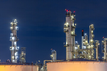 Oil and gas refinery plant at night, Global business energy logistic transportation, Oil and gas refinery petrochemical industrial, Petrochemical refinery industrial energy supply chain.