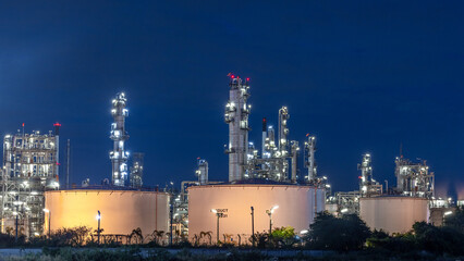 Oil and gas refinery plant at night, Global business energy logistic transportation, Oil and gas refinery petrochemical industrial, Petrochemical refinery industrial energy supply chain.