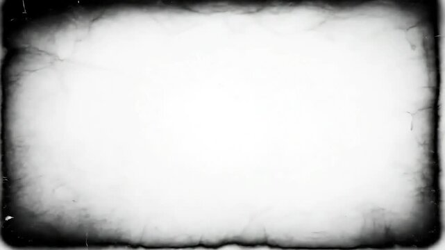 A textured white rectangle framed by a dark, distressed, and aged border.