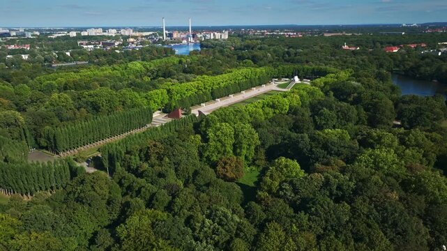 Aerial drone view of the Soviet War Memorial Treptow in Berlin, Germany &ndash; monumental WWII memorial complex with statue, cemetery, and Treptower Park seen from above. 10 September 2024