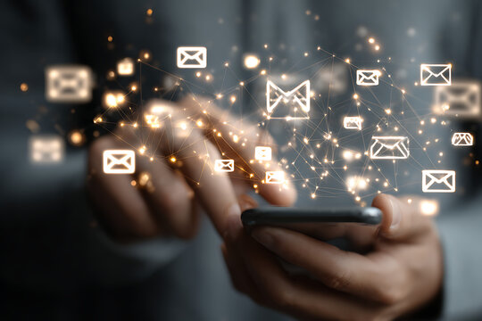 Connecting the world through digital messages, a person's hands skillfully navigate their smartphone amidst a network of glowing email icons and light particles, signifying global communication. - Powered by Adobe