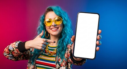 Smiling young woman pointing to blank smartphone screen – mockup space for app, website, or marketing design