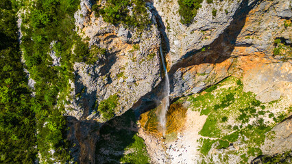 Aerial view of Rinka Waterfall in the stunning Logar Valley, Slovenia. Surrounded by the...